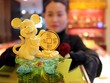 Chuột vàng trong một cửa hàng trang sức ở Trung Quốc. Ảnh: China Daily.