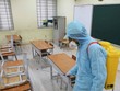 Phun thuốc khử trùng lần 2 tại trường THCS Mai Động (Hà Nội) để phòng chống dịch bệnh viêm đường hô hấp cấp do chủng mới của virus corona. (Ảnh: Thanh Tùng/TTXVN).