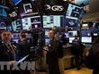Giao dịch viên tại Sàn giao dịch chứng khoán New York, Mỹ. (Ảnh: THX/TTXVN).