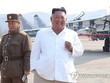 Ông Kim Jong-un trong một buổi thị sát đội máy bay Triều Tiên. Bức ảnh được truyền thông nước này đăng tải hôm 12/4 (Ảnh: Yonhap).