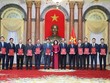 Phó Chủ tịch nước Đặng Thị Ngọc Thịnh chúc mừng 12 vị tân đại sứ vinh dự được Đảng, nhà nước, nhân dân tin tưởng giao phó trọng trách.- Ảnh: TTXVN.
