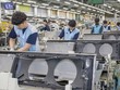 Công nhân làm việc tại một nhà máy của Samsung. (Nguồn: Samsung Electronics).