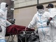 Chuyển thi thể bệnh nhân tử vong do Covid-19 tới nhà tang lễ tại New York, Mỹ. Ảnh: AFP/TTXVN.
