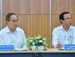 Bí thư Thành uỷ TPHCM Nguyễn Văn Nên (phải) và Trưởng đoàn ĐBQH TPHCM Nguyễn Thiện Nhân (trái).
