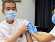 Nhật Bản tiêm chủng vaccine ngừa Covid-19. Ảnh: Reuters.