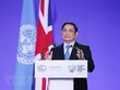 Thủ tướng Phạm Minh Chính phát biểu tại Hội nghị lần thứ 26 các bên tham gia Công ước khung của Liên hợp quốc về biến đổi khí hậu (COP26). (Ảnh: Dương Giang/TTXVN).
