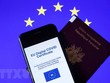 Hộ chiếu và chứng chỉ số COVID-19 do Liên minh châu Âu ban hành, tại Brussels, Bỉ ngày 16/6/2021. (Ảnh: AFP/TTXVN).