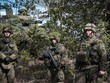 Binh sỹ Phần Lan tham gia một cuộc tập trận chung với Anh, Latvia, Estonia và Mỹ. Ảnh: AFP.
