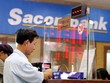 Mới đây, Sacombank đã thông báo tạm “khóa van” đối với tín dụng bất động sản, kể cả cho vay mua nhà. Ảnh: Dũng Minh.