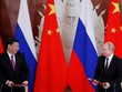 Chủ tịch Trung Quốc Tập Cận Bình và Tổng thống Nga Vladimir Putin ký biên bản ghi nhớ ở Moscow, Nga. Ảnh: Reuters.