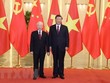 Tổng Bí thư Nguyễn Phú Trọng và Tổng Bí thư, Chủ tịch Trung Quốc Tập Cận Bình. (Ảnh: Trí Dũng/TTXVN).