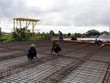 Thi công cầu Thầy Xếp trên tuyến đường ven biển Rạch Giá-Hòn Đất, Kiên Giang bằng vốn đầu tư công. (Ảnh: Lê Huy Hải/TTXVN).