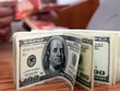 Đồng USD. (Ảnh: AFP/TTXVN)
