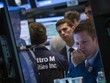 Phố Wall đi ngang do chịu tác động của các thông tin trái chiều - Ảnh: Reuters