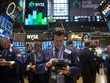 Phố Wall biến động nhẹ trong phiên thứ Ba do chịu các thông tin trái chiều - Ảnh: Reuters