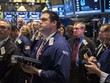 Phố Wall đóng cửa ít biến động trong phiên cuối tuần - Ảnh: Reuters