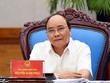 Thủ tướng Nguyễn Xuân Phúc nêu hàng loạt giải pháp khơi thông tiềm năng tăng trưởng, kiểm soát lạm phát khi kết luận Phiên họp. Ảnh: VGP/Quang Hiếu