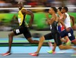 Usain Bolt (trái) có hợp đồng quảng cáo với rất nhiều công ty nổi tiếng thế giới. Ảnh: Reuters