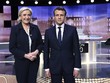 Marine Le Pen (trái) và Emmanuel Macron. Ảnh:Reuters