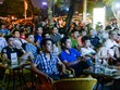 Khán giả tập trung xem bóng đá tại một quán cà phê tại Hà Nội. Ảnh:AFP.