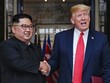 Trump (phải) và Kim Jong-un tại hội nghị thượng đỉnh đầu tiên ở Singapore tháng 6/2018. Ảnh: Reuters.