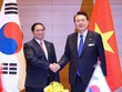 Thủ tướng Phạm Minh Chính và Tổng thống Hàn Quốc Yoon Suk Yeol - Ảnh: VGP/Nhật Bắc