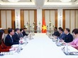 Thủ tướng Lê Minh Hưng tiếp ông Sanjay Dhawan, Phó Chủ tịch Tập đoàn ACME của Ấn Độ. (Ảnh: Dương Giang/TTXVN)