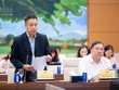 Thứ trưởng Bộ Công thương Nguyễn Việt Sơn trình bày tờ trình - Ảnh: QH.