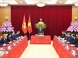 Thường trực Ban Bí thư Trần Cẩm Tú tiếp Đoàn cán bộ cấp cao Đảng Nhân dân Cách mạng Lào. (Ảnh: Phương Hoa/TTXVN)