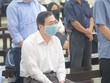 Ông Vũ Huy Hoàng hầu tòa. 