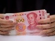 Trung Quốc tăng cường kiểm soát dòng vốn chảy ra nước ngoài