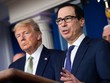 Tổng thống Mỹ Donald Trump và Bộ trưởng Tài chính Steven Mnuchin trả lời phỏng vấn trong cuộc họp báo tại Nhà Trắng hôm 17/3. Ảnh: Reuters.