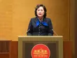 Thống đốc NHNN Nguyễn Thị Hồng trình bày báo cáo tiếp thu, giải trình ý kiến của Ủy ban Thường vụ Quốc hội về dự án Luật Bảo hiểm tiền gửi sáng 10/12.