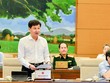 Tổng thanh tra Chính phủ Lê Minh Khái trình bày báo cáo về công tác phòng, chống tham nhũng tại cuộc họp của Ủy ban Thường vụ Quốc hội.
