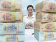 Tiền trong hệ thống ngân hàng đang dồi dào và có lãi suất lãi thấp. Ảnh: Dũng Minh