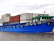 Tàu vận chuyển hàng hóa từ Cảng thủy nội địa Terminal Cát Lái Giang Nam đi Cảng Cái Mép - Thị Vải. Ảnh: Phạm Hà