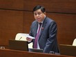 Bộ trưởng Bộ Kế hoạch và Đầu tư Nguyễn Chí Dũng trong phiên chất vấn sáng 12/11/2021.