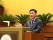 Chủ nhiệm Uỷ ban Kinh tế Vũ Hồng Thanh báo cáo giải trình.