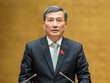 Chủ nhiệm Ủy ban Khoa học, Công nghệ và Môi trường Lê Quang Huy báo cáo Quốc hội trong phiên làm việc đầu giờ sáng 25/10