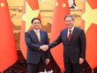 Thủ tướng Phạm Minh Chính và Thủ tướng Trung Quốc Lý Cường (Ảnh: Nhật Bắc)