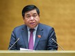  Bộ trưởng Bộ Kế hoạch và Đầu tư Nguyễn Chí Dũng trình bày báo cáo.