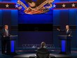 Ông Donald Trump và đối thủ Joe Biden tại cuộc tranh luận trực tiếp lần thứ nhất ở thành phố Cleveland, bang Ohio tháng 9/2020. Ảnh: AFP/TTXVN