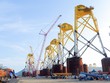 Công trường thi công chân đế điện gió ngoài khơi tại cảng PTSC của Tập đoàn Dầu khí Việt Nam.