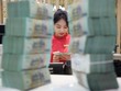Sức cầu tín dụng đang được cải thiện. Ảnh: Dũng Minh 