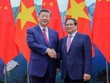 Thủ tướng Phạm Minh Chính và Tổng Bí thư, Chủ tịch nước Trung Quốc Tập Cận Bình. Ảnh: Nhật Bắc 