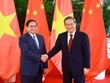 Thủ tướng Phạm Minh Chính và Thủ tướng Trung Quốc Lý Cường trước khi bắt đầu cuộc hội đàm chiều ngày 24/6. Ảnh: Nhật Bắc 