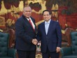 Thủ tướng Chính phủ Phạm Minh Chính (phải) và ông Bendito dos Santos Freitas.