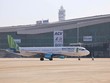 Tàu bay của Bamboo Airways hạ cánh tại Cảng hàng không quốc tế Long Thành. 