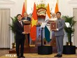 Tổng Bí thư, Chủ tịch nước Tô Lâm và Thủ tướng Cộng hòa Ấn Độ Narendra Modi chứng kiến lễ trao các văn kiện hợp tác giữa 2 nước. (Ảnh: Thống Nhất/TTXVN)