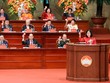 Ủy viên Bộ Chính trị, Bí thư Trung ương Đảng, Chủ tịch UBTƯ MTTQ Việt Nam Bùi Thị Minh Hoài và các đại biểu tiến hành biểu quyết tại Đại hội. Ảnh: Quang Vinh.